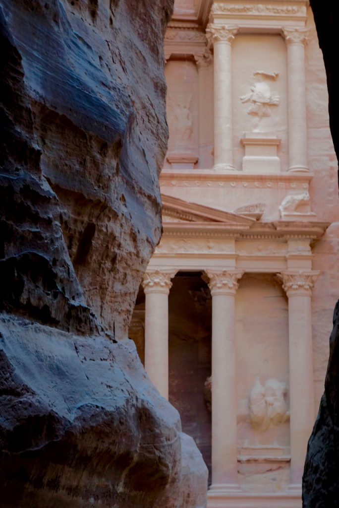 This is the first view of the Treasury as it slowly becomes visible at the end of the slot canyon entrance